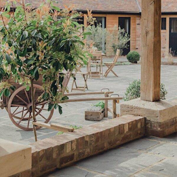 Barns and Yard courtyard with castle blend paving.